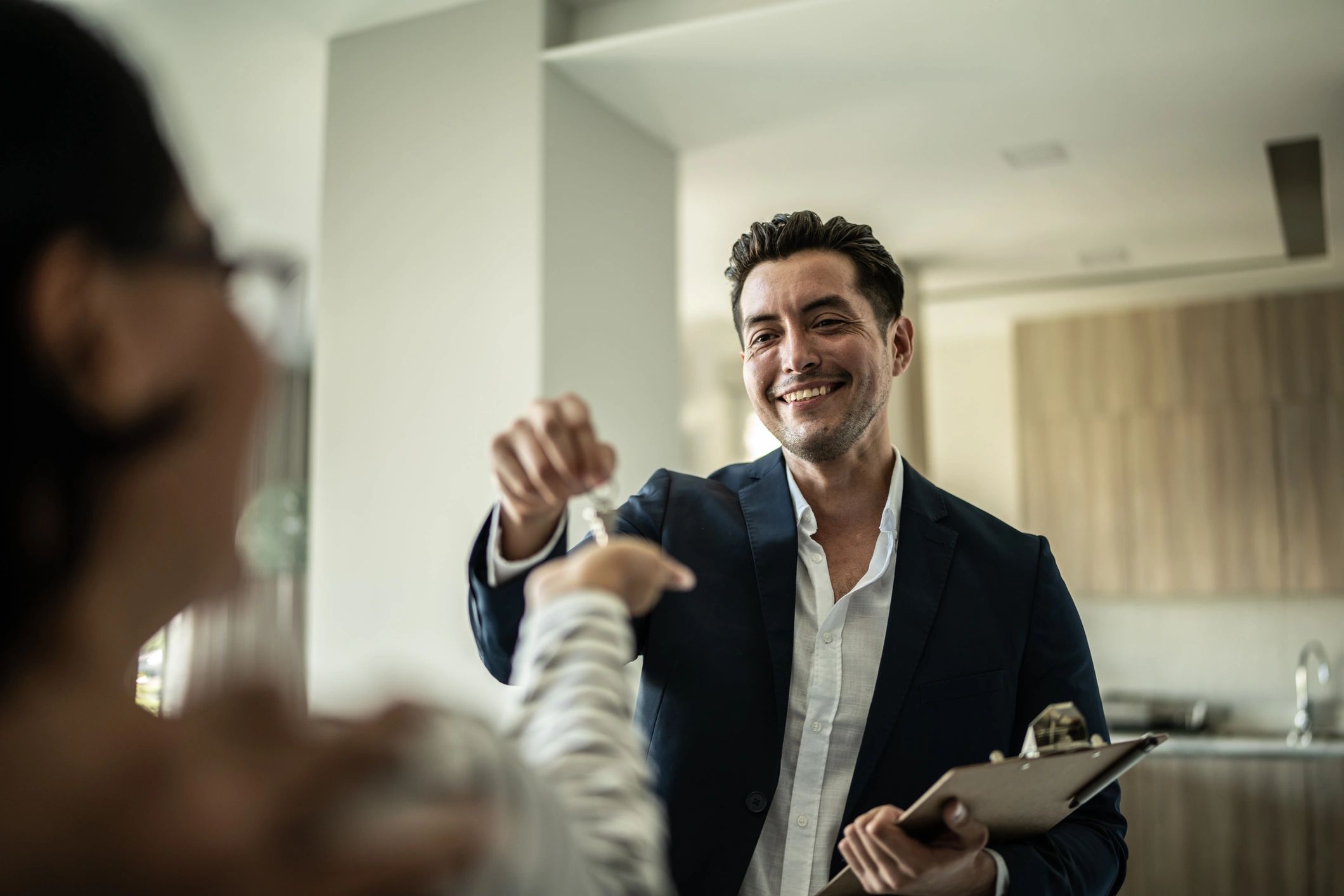 New renter receiving keys for an apartment