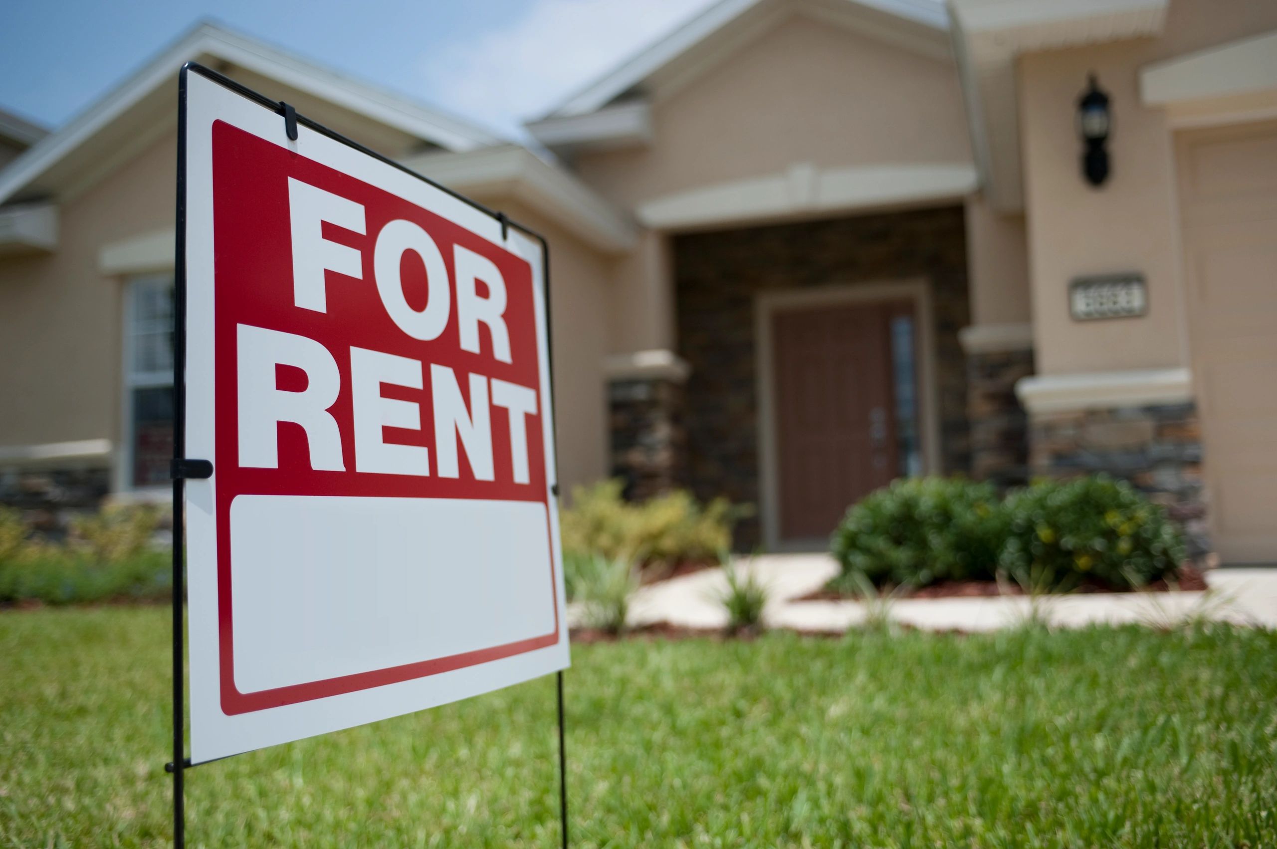 For rent sign representing a property in transition
