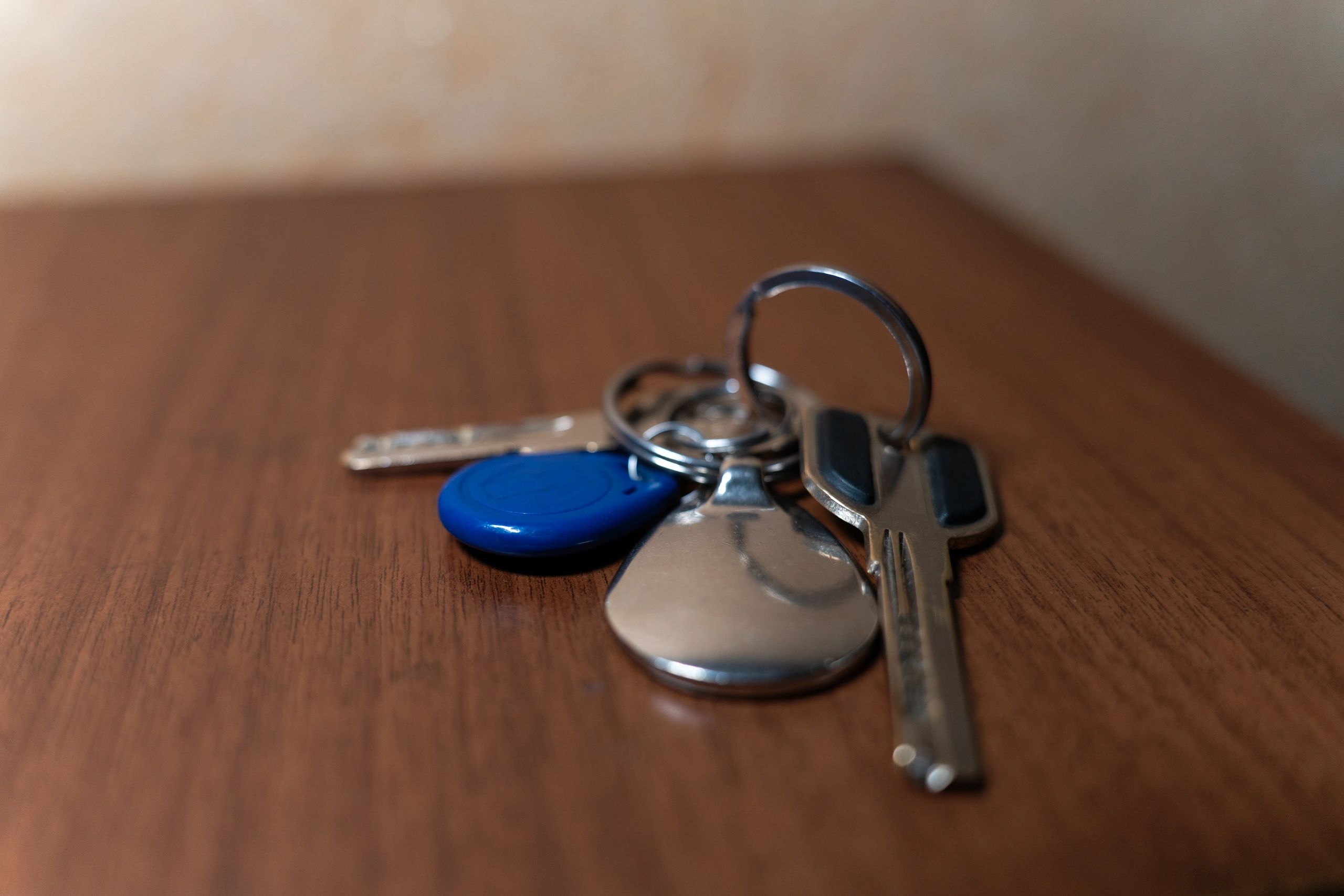 House keys on a wooden surface